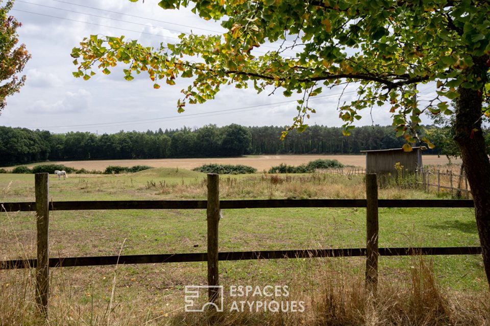 Maison de caractère sur intime domaine équestre arboré