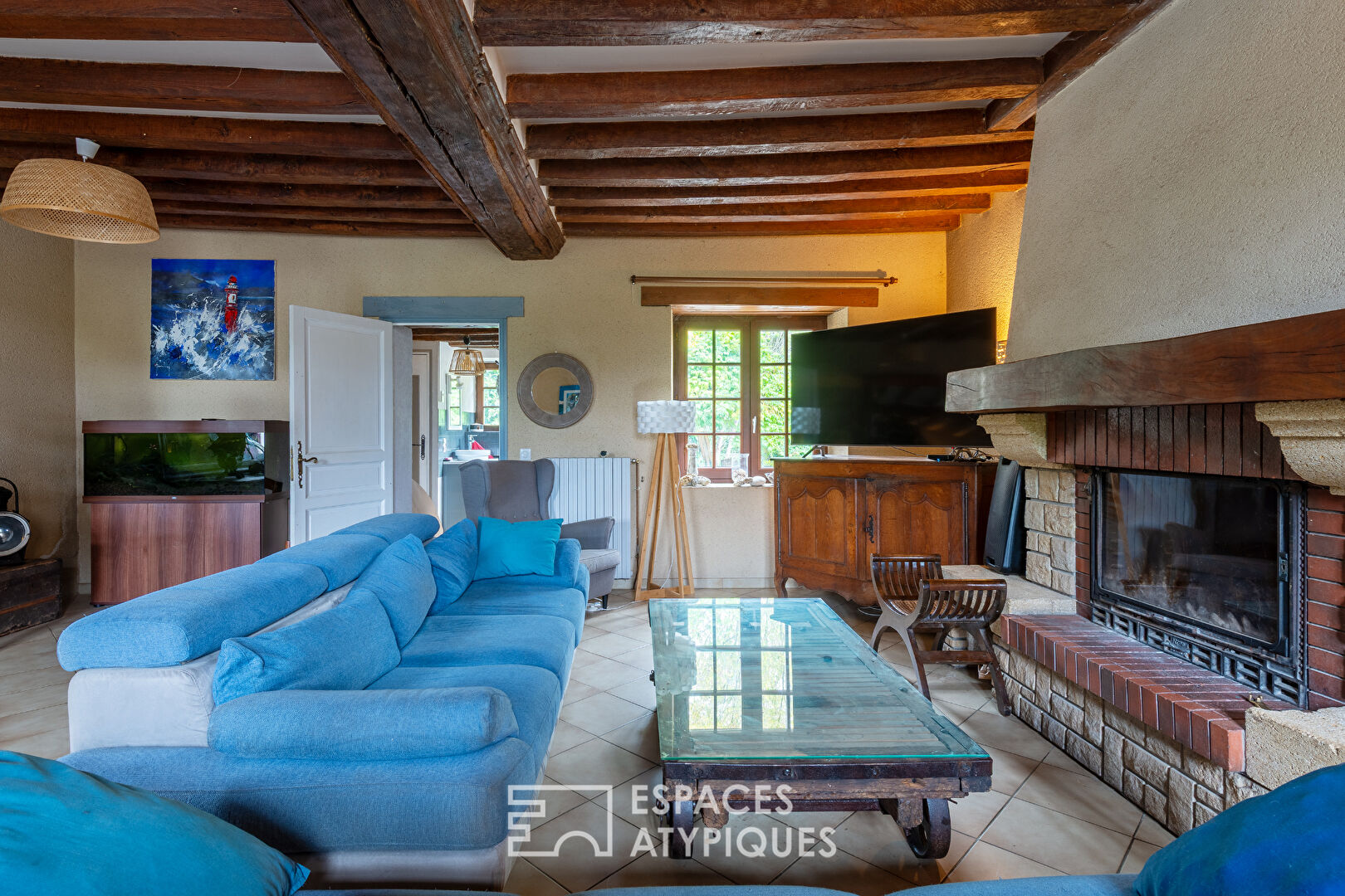 Large property with outbuildings and lake