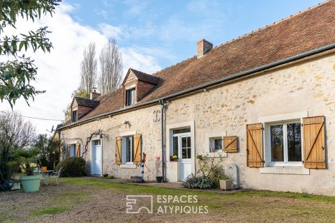 Stone house in the heart of a vast wooded park