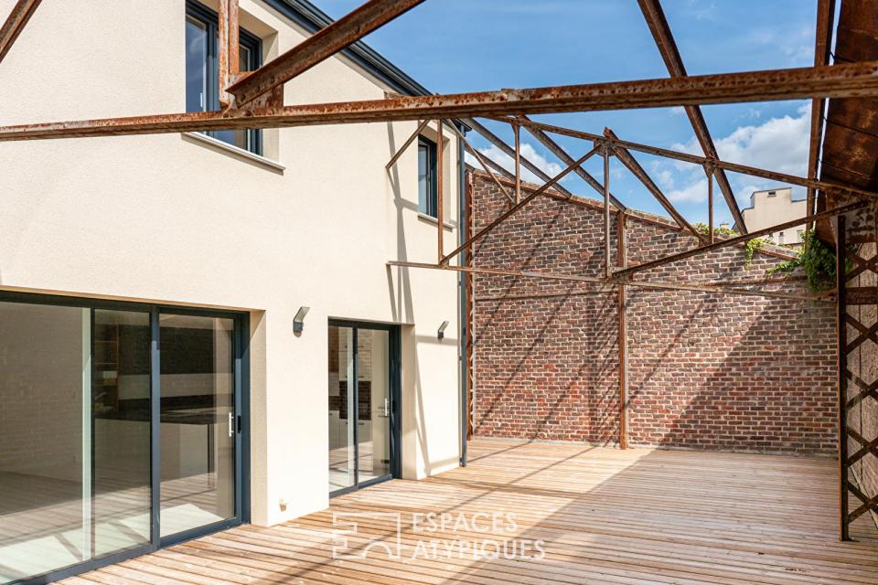 Loft contemporain avec terrasse et structure métallique