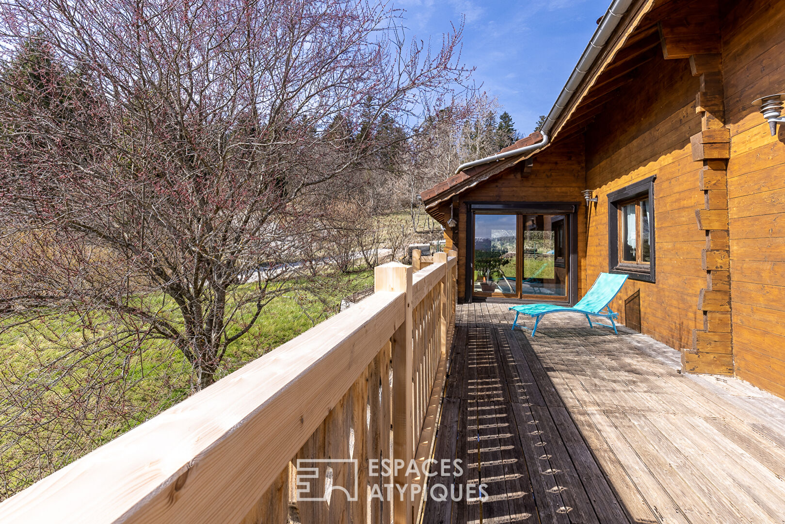 The real log cabin with its indoor swimming pool