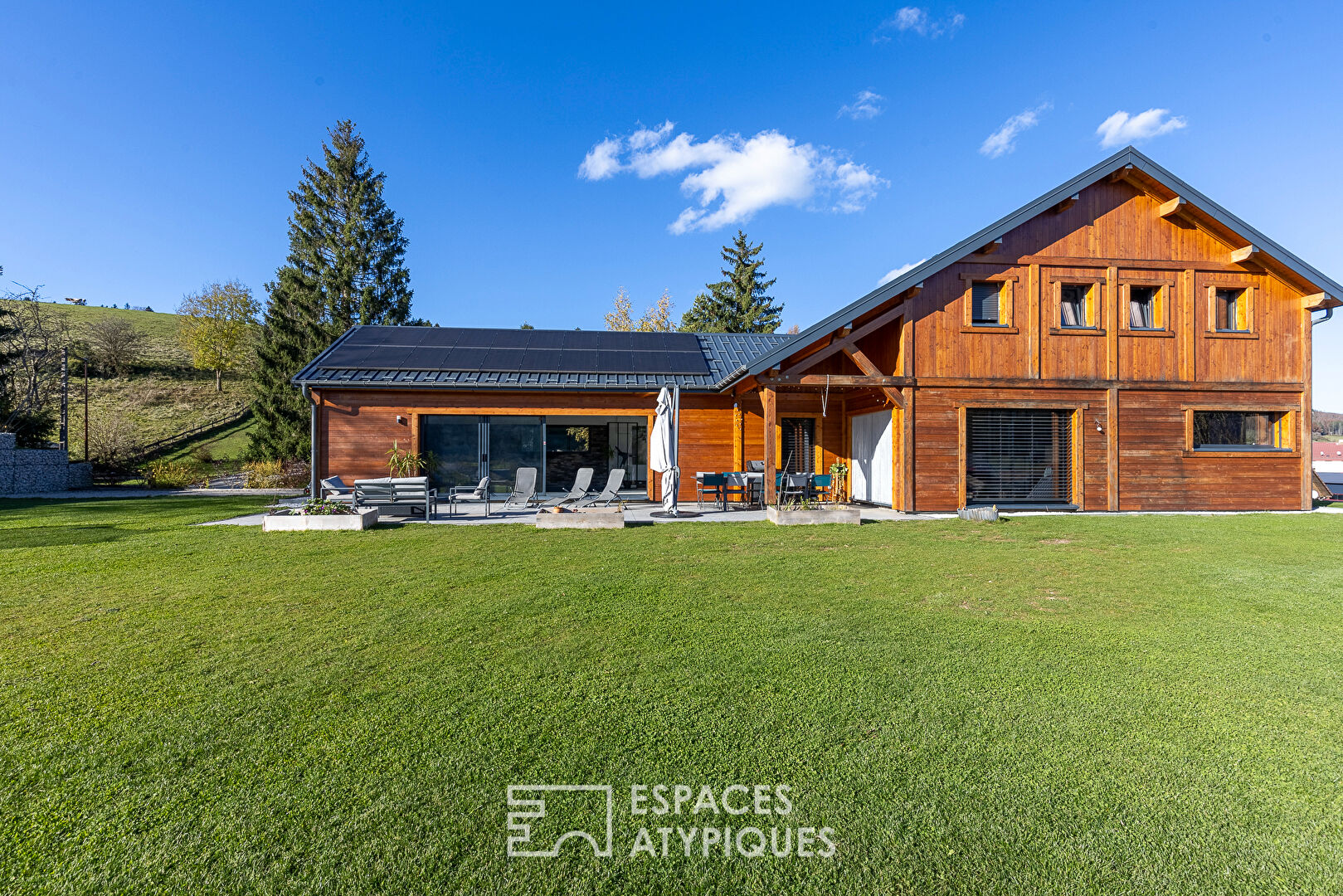 The contemporary chalet close to Switzerland with its unobstructed view and indoor swimming pool