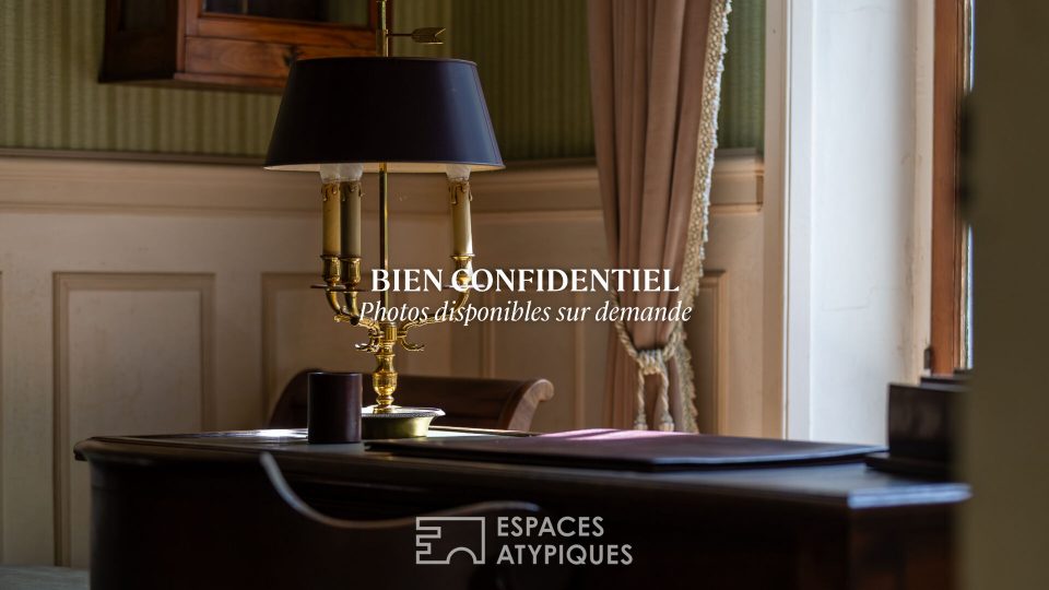 Manoir chargé d'histoire avec dépendance à fort potentiel sur un terrain clos de 2ha