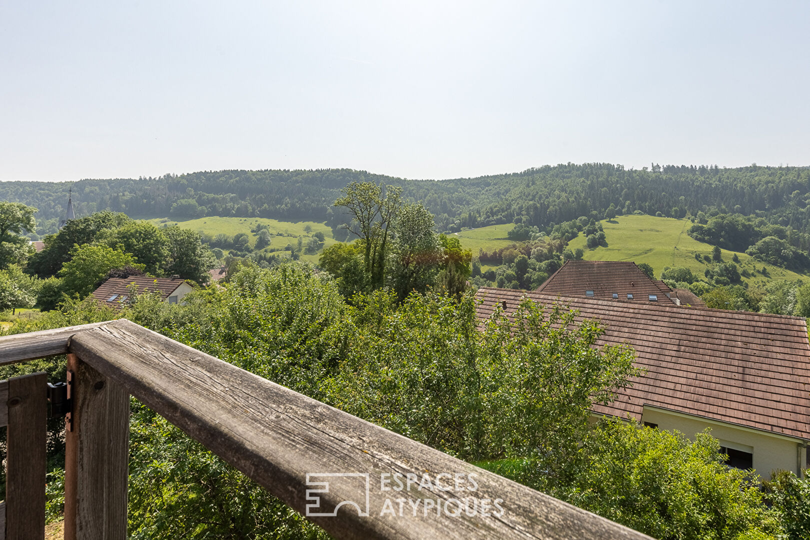 Maison à ossature bois au calme avec son jardin paysagé