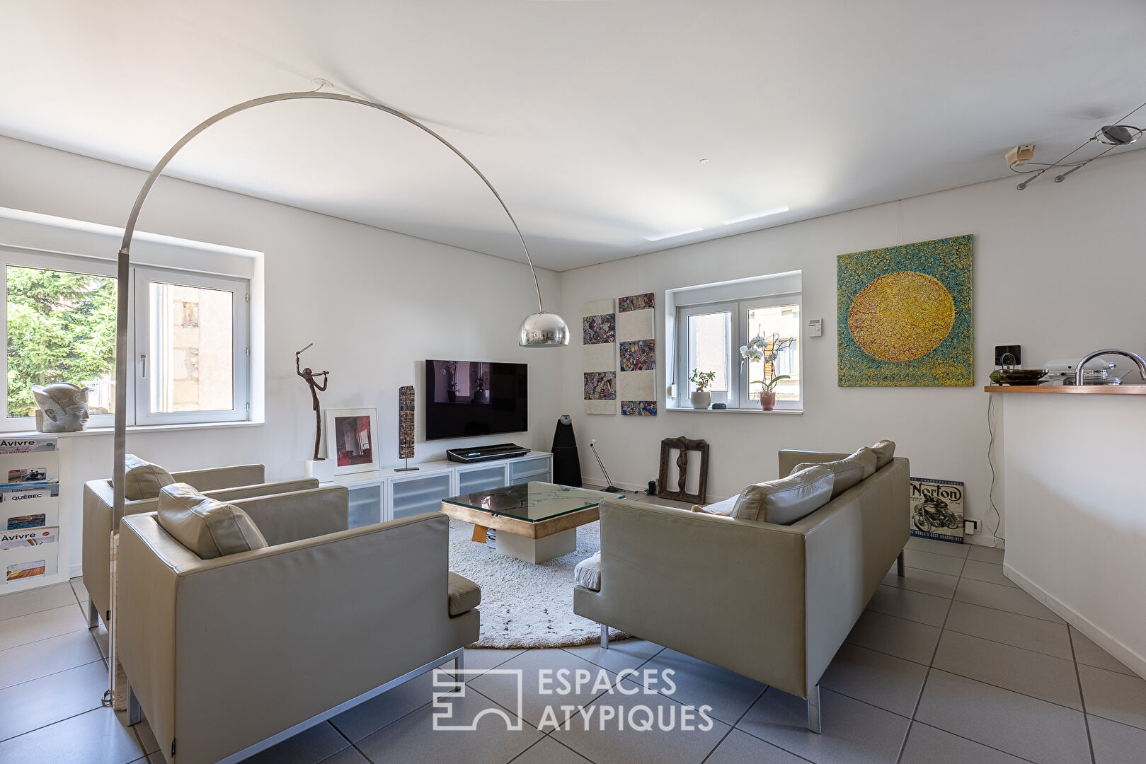 Appartement-maison indépendante avec terrasse, garage et atelier