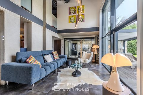 Concrete and nature architect-designed house with swimming pool