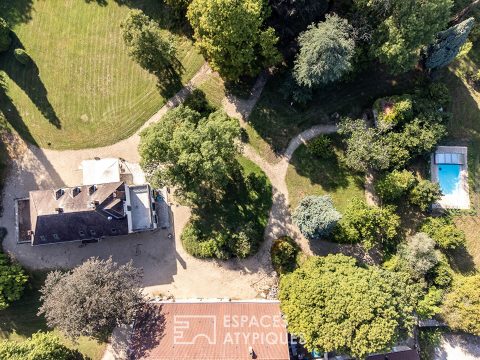 Maison de maître aux multiples projets nichée dans un parc arboré de 9 hectares