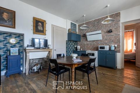 Appartement de caractère avec fontaine sculptée dans la Boucle