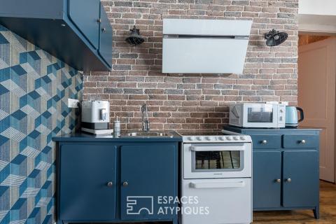 Appartement de caractère avec fontaine sculptée dans la Boucle