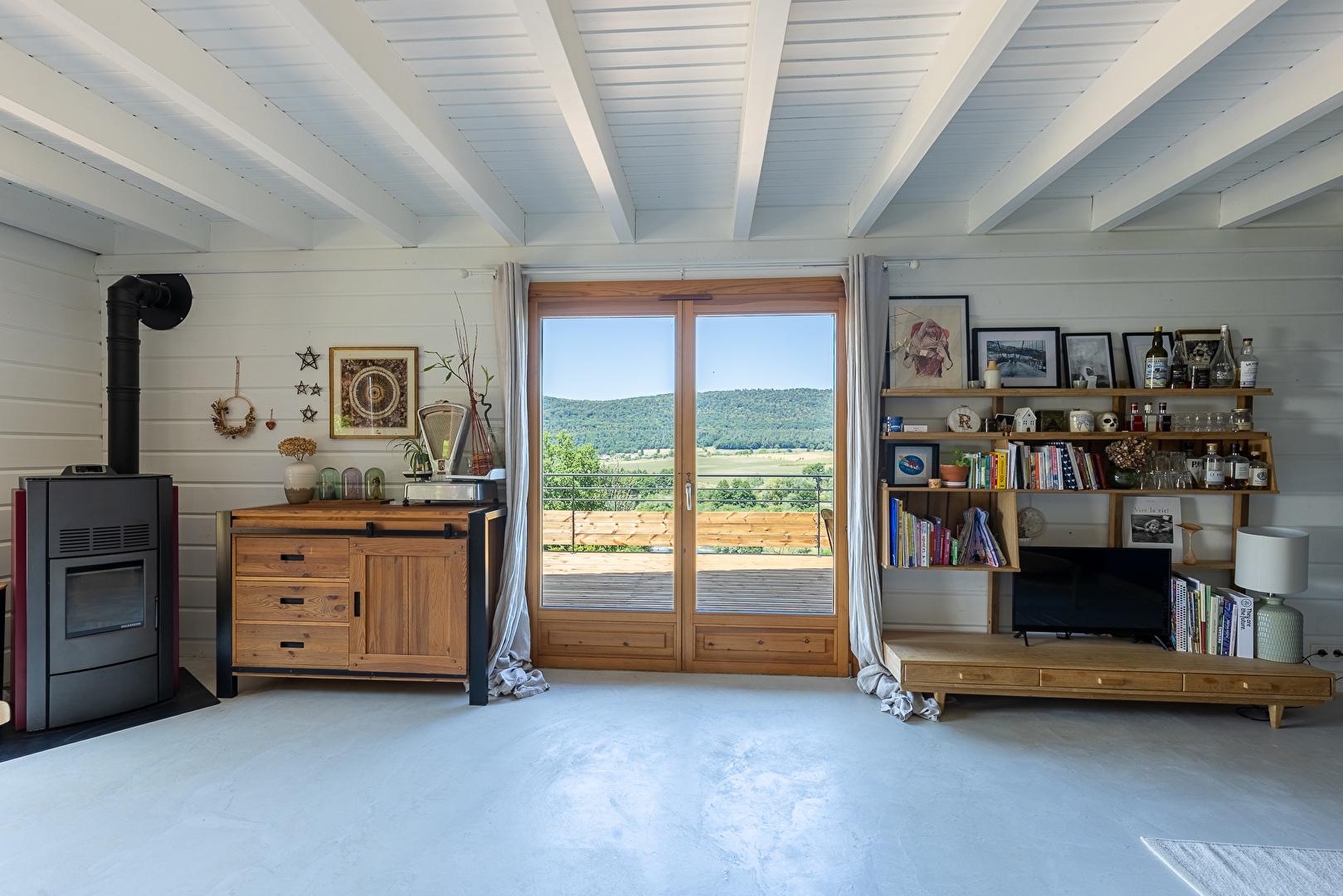 Chalet avec terrasse et panorama sur la nature
