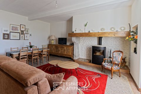 Demeure authentique avec grange aménageable et terrains à bâtir