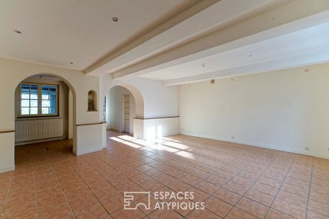 Early 1900s townhouse rehabilitated in the heart of the village