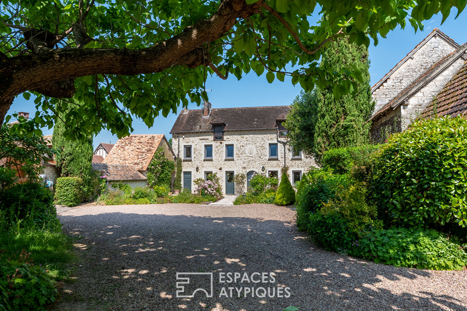 Stone family house with swimming pool and outbuildings