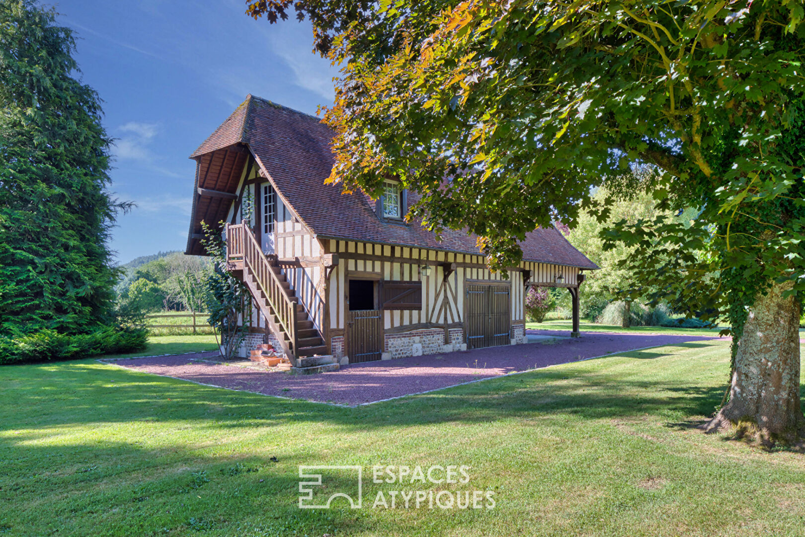 Property crossed by the river in one of the most beautiful villages in France