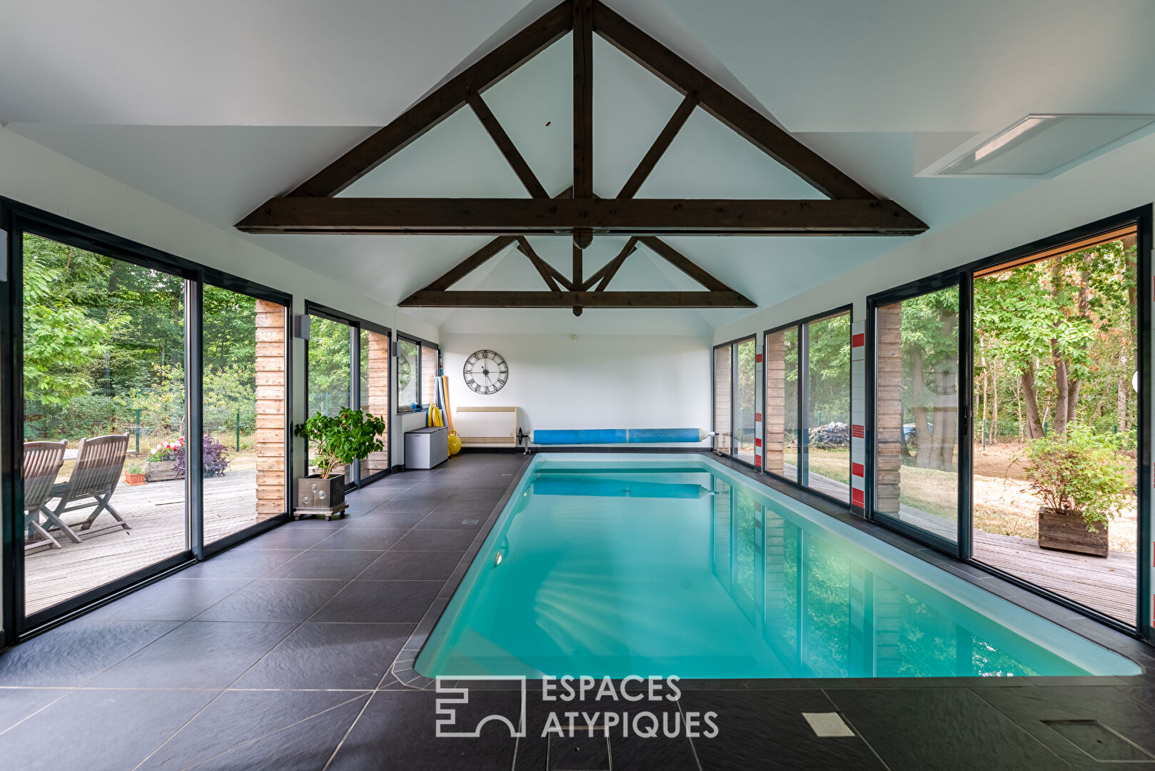 Architect-designed house on the edge of the forest with indoor swimming pool