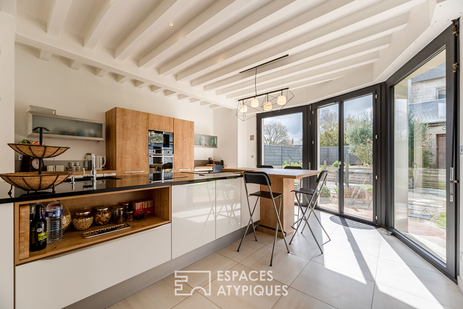 Maison bourgeoise à pans de bois avec extension en centre ville