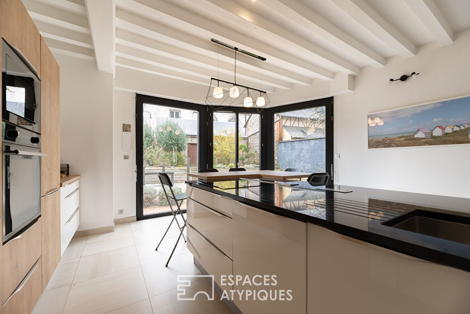 Maison bourgeoise à pans de bois avec extension en centre ville