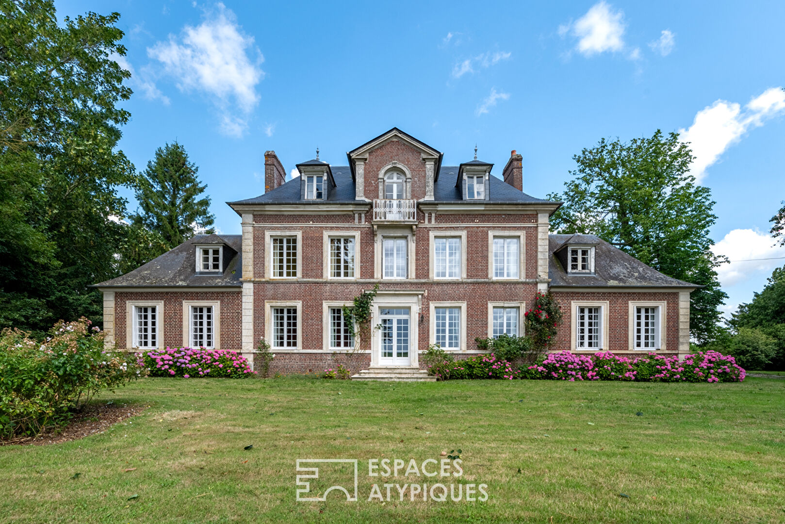 Maison de maître dans un parc arboré