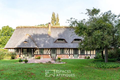 Charmante chaumière avec jardin paysagé et dépendance