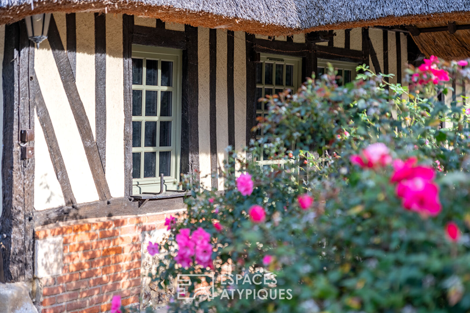 Charming thatched cottage with landscaped garden and outbuilding