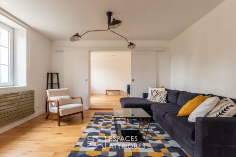 Propriété singulière avec son jardin arboré