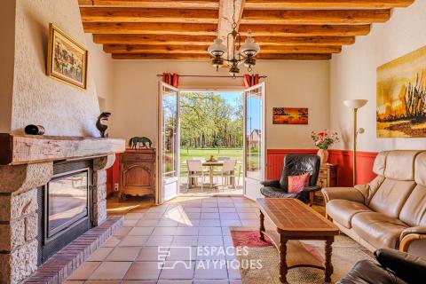 Propriété avec installations équestres de loisir dans un parc de 1,5 hectare