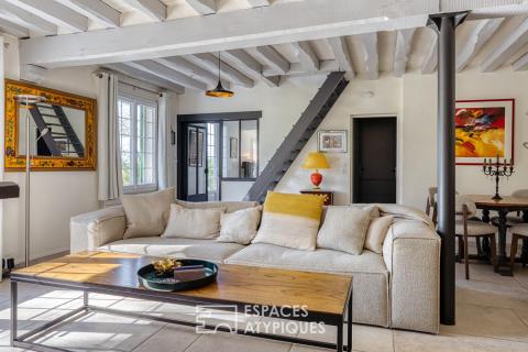 Élégante chaumière et son parc arboré