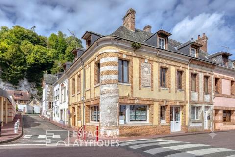 Village house with commercial premises and apartment