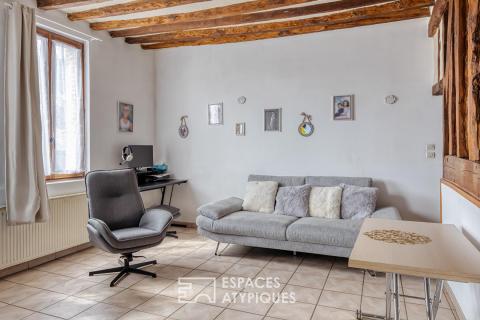 Village house with commercial premises and apartment