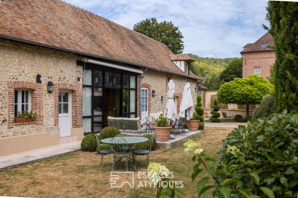 Ancien moulin à blé converti en atelier et maison rénovée