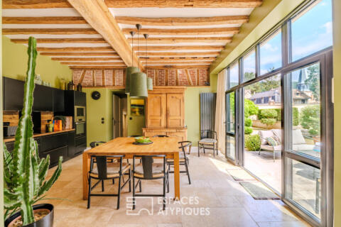 Ancien moulin à blé converti en atelier et maison rénovée