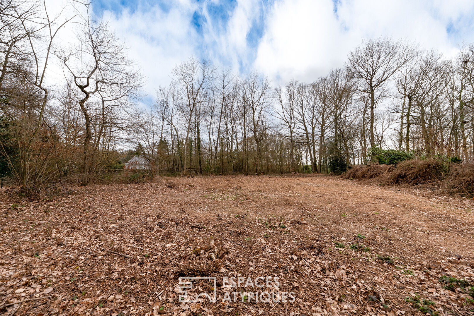 Rare building land with trees in the heart of the village