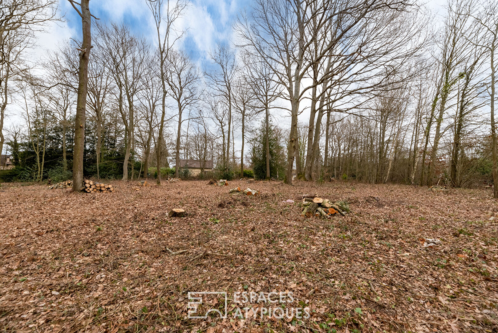 Rare building land with trees in the heart of the village