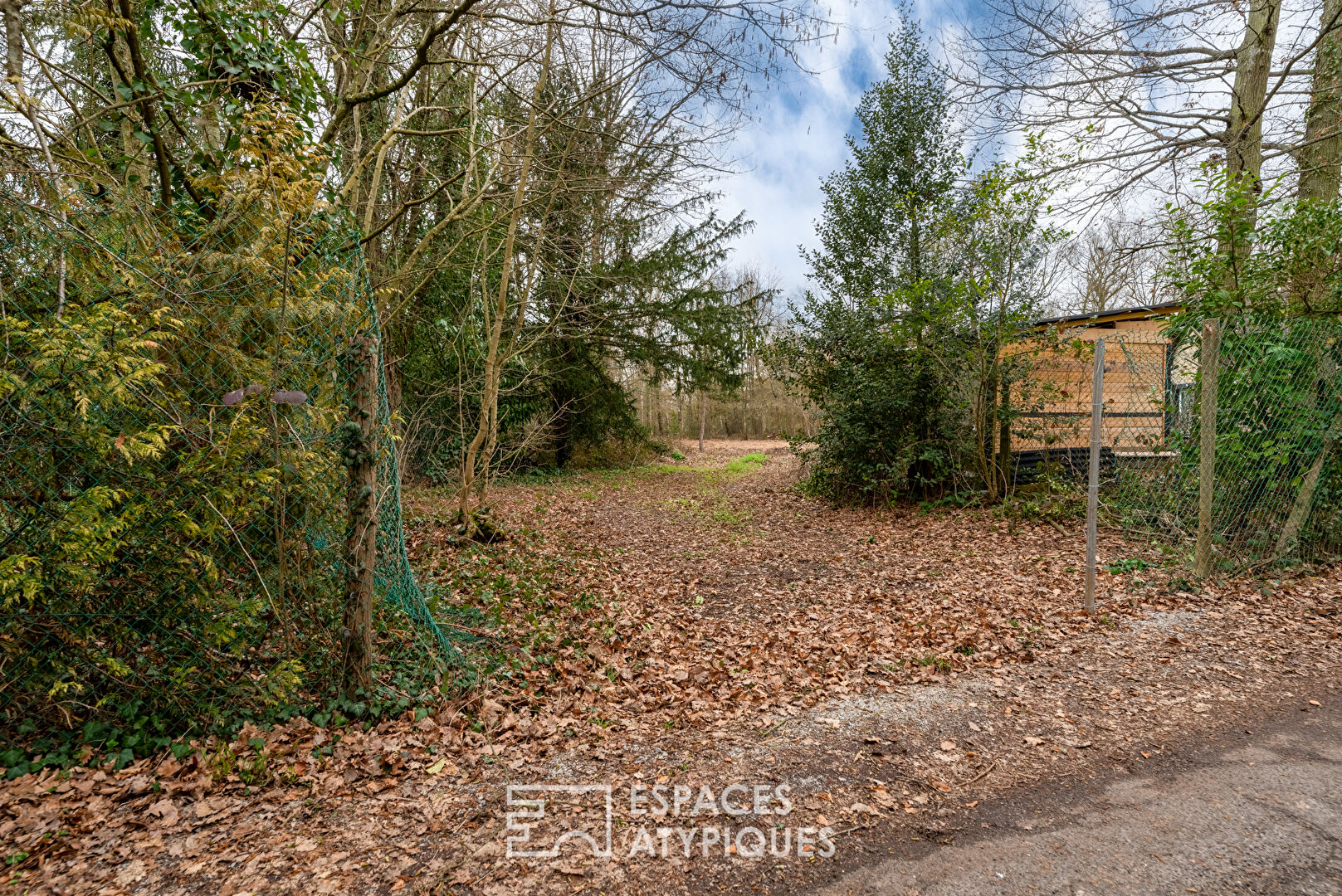 Rare building land with trees in the heart of the village