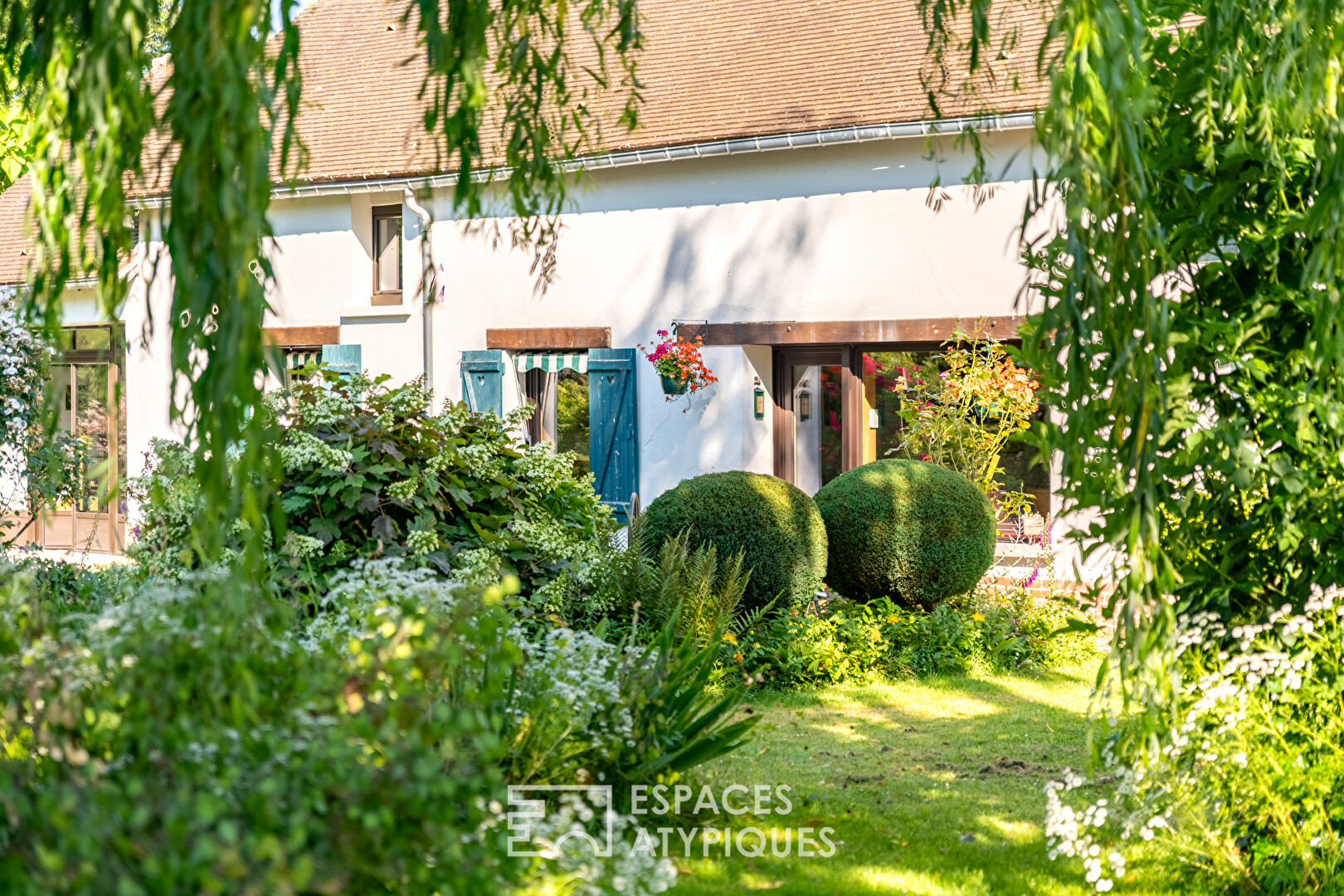 Old renovated barn with charming landscaped garden