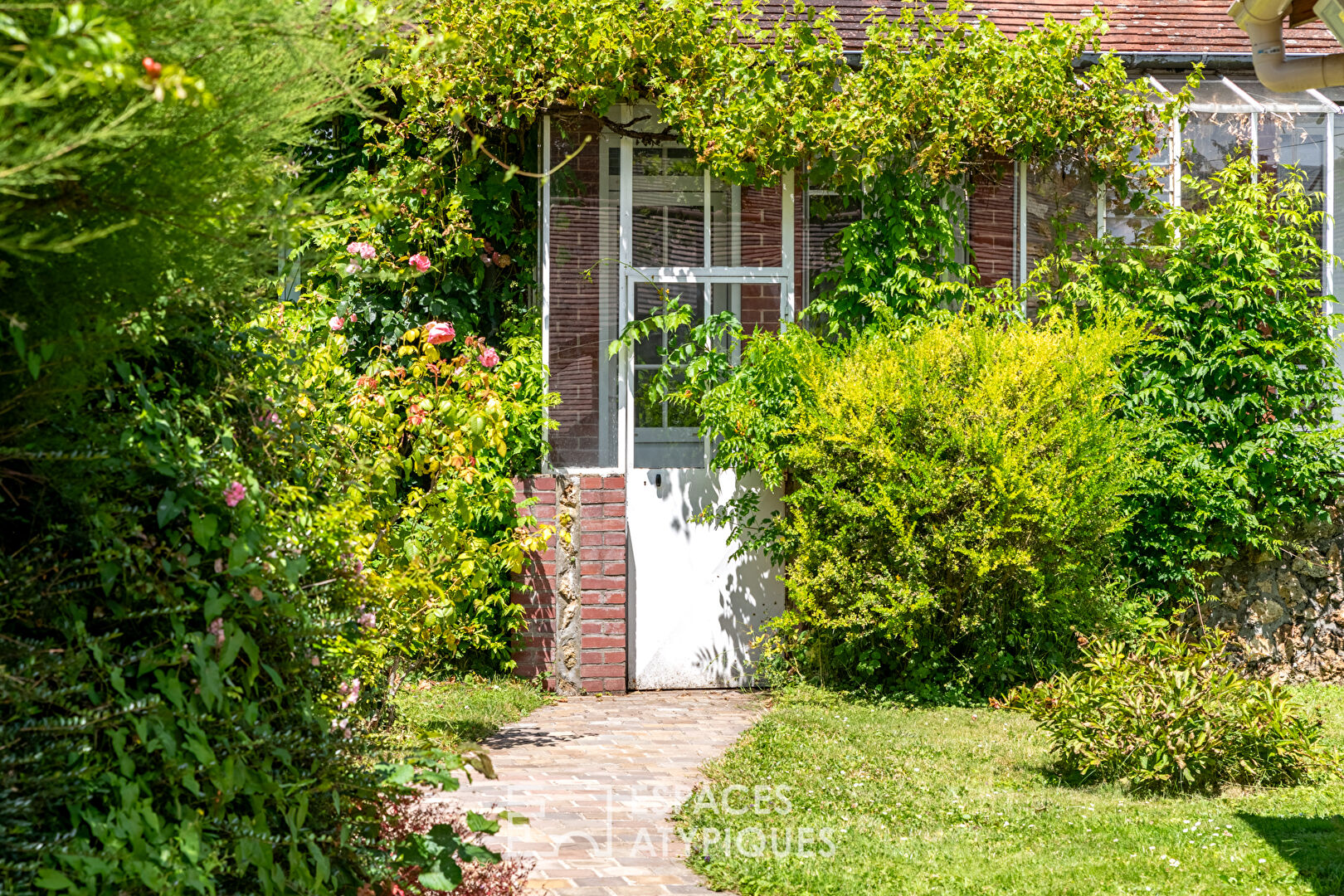 Village house and its bucolic garden