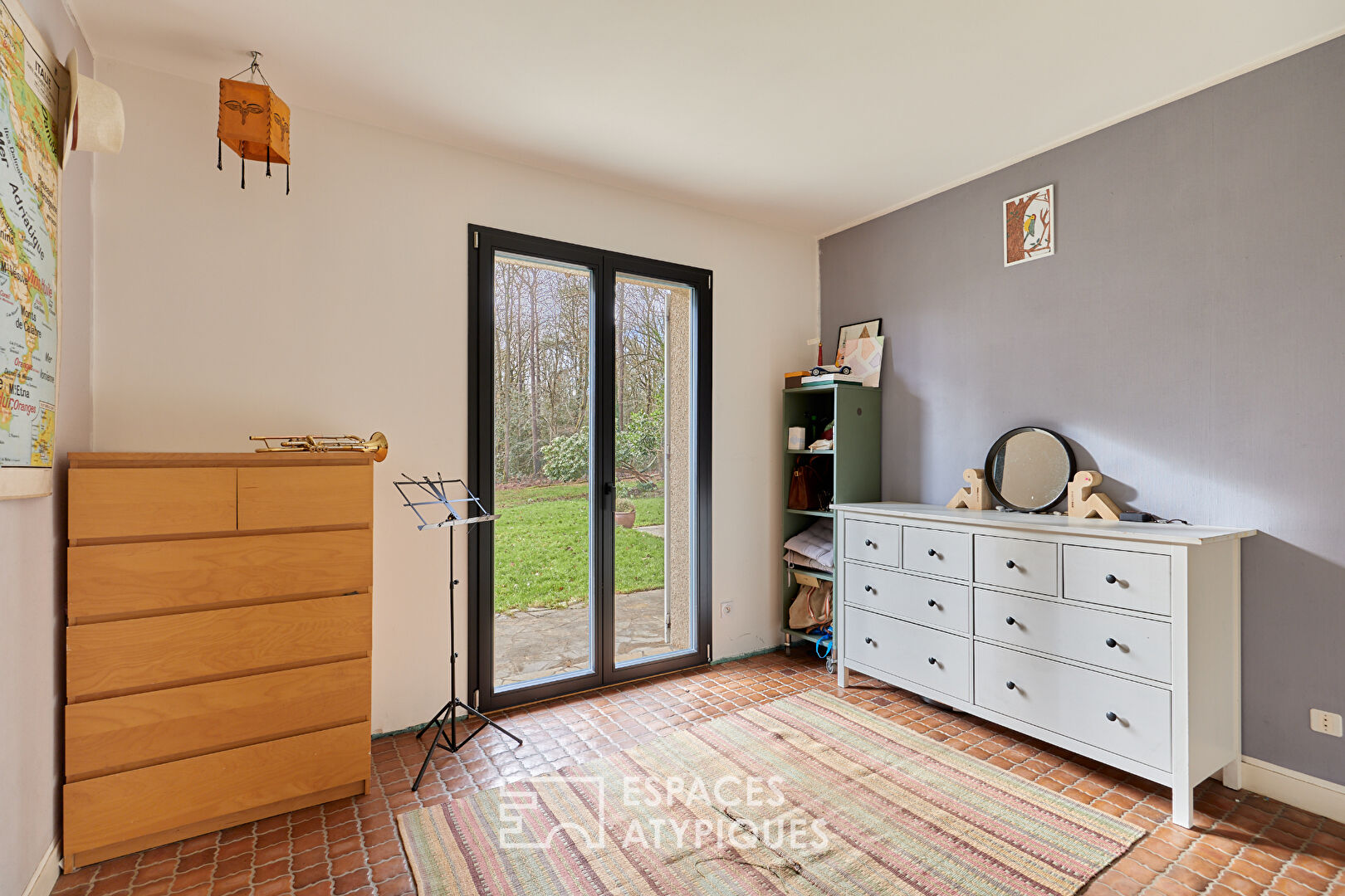 1970s property revisited in wooded park in central Bernay