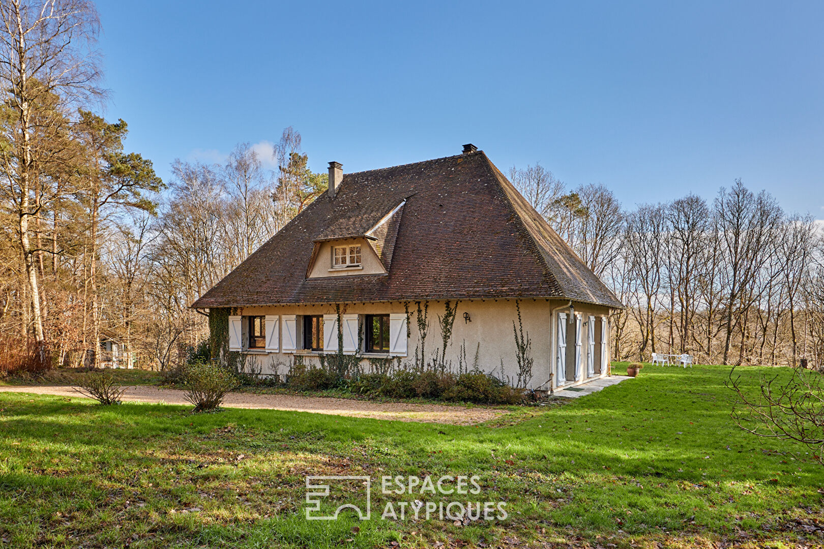 1970s property revisited in wooded park in central Bernay
