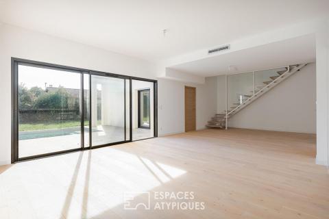 New contemporary home with a pool at the end of a cul-de-sac