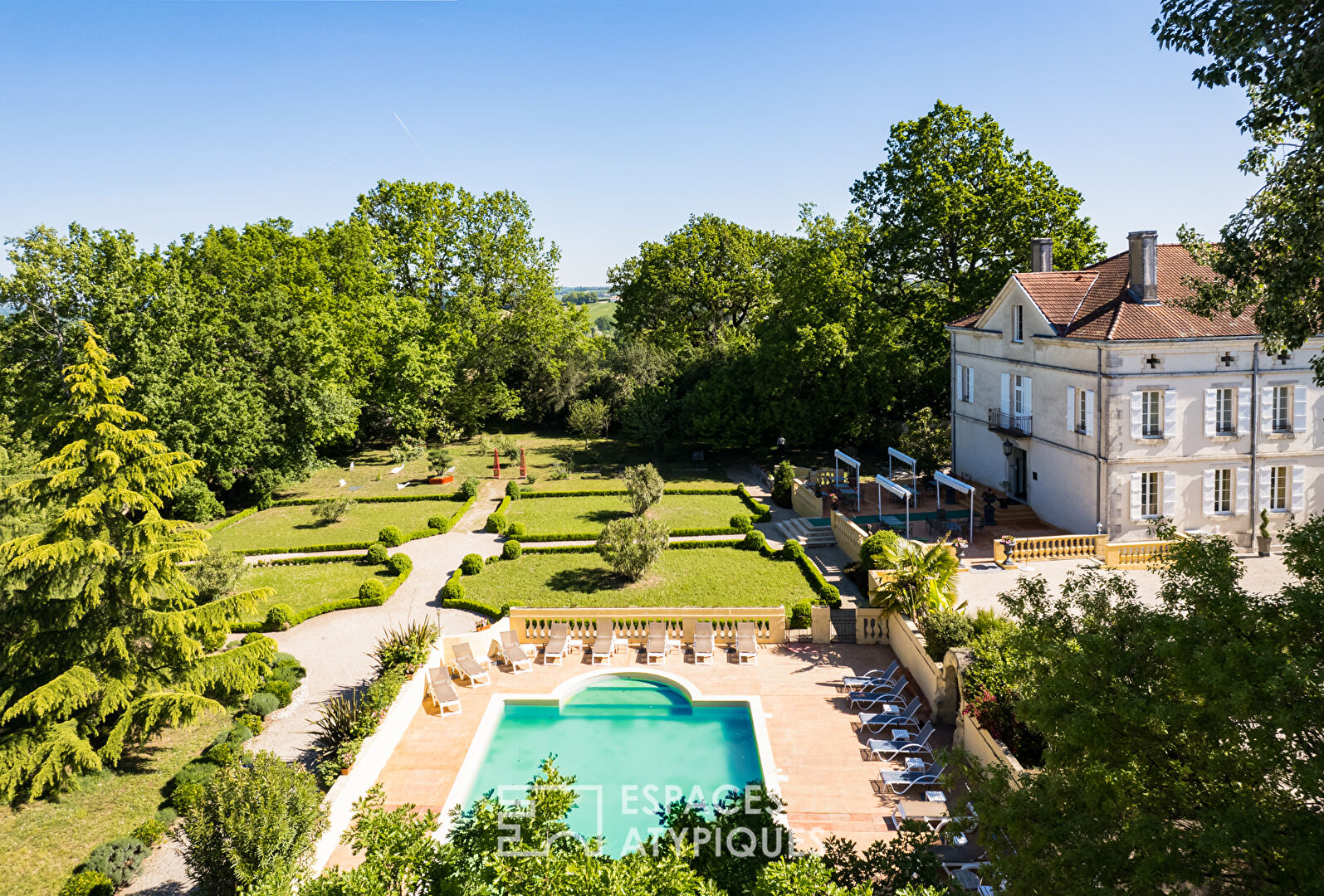 Nineteenth-century manor house with formal garden.