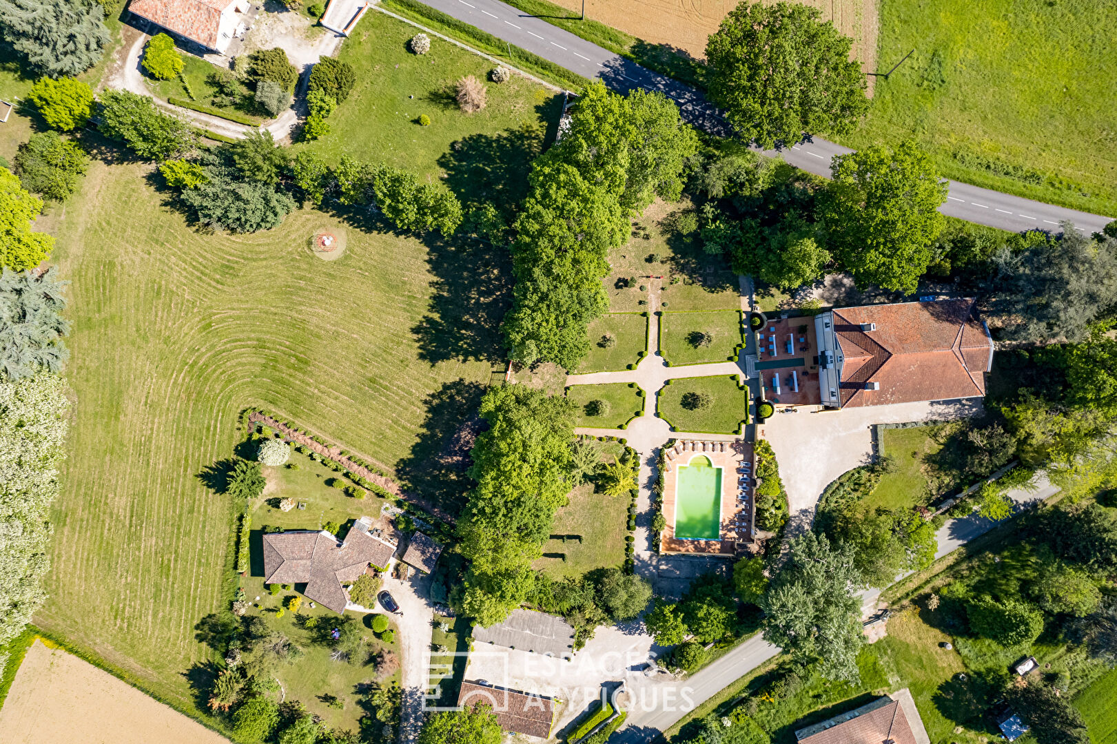 Nineteenth-century manor house with formal garden.