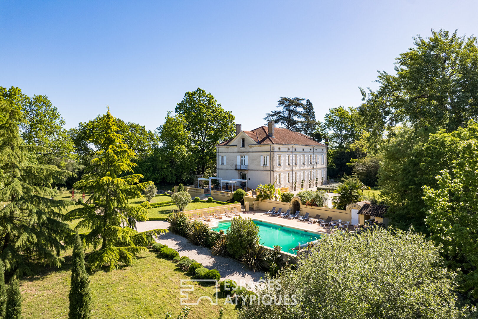 Nineteenth-century manor house with formal garden.