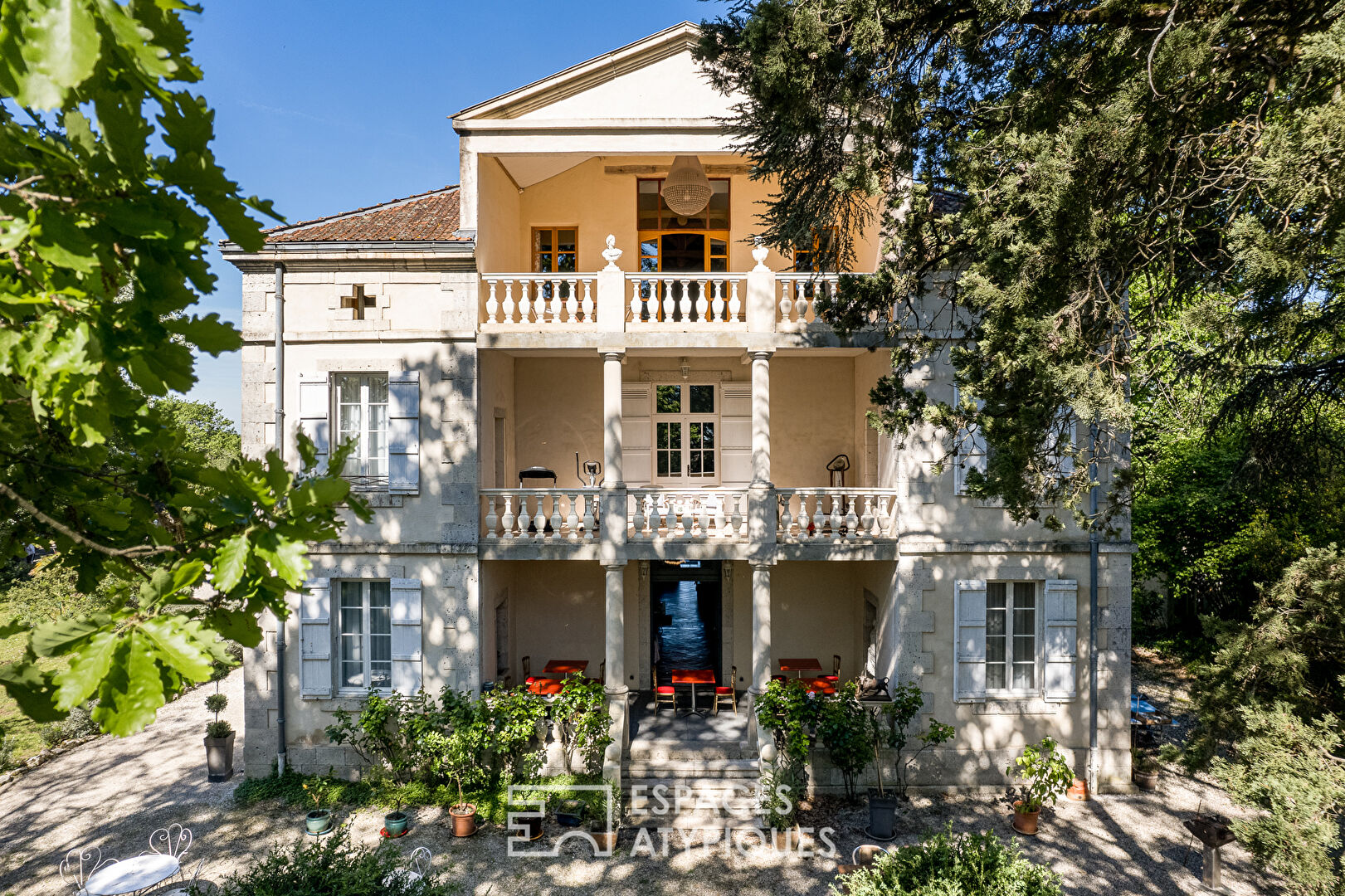 Nineteenth-century manor house with formal garden.