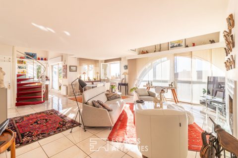 Loft lumineux avec terrasse et vue sur le parc