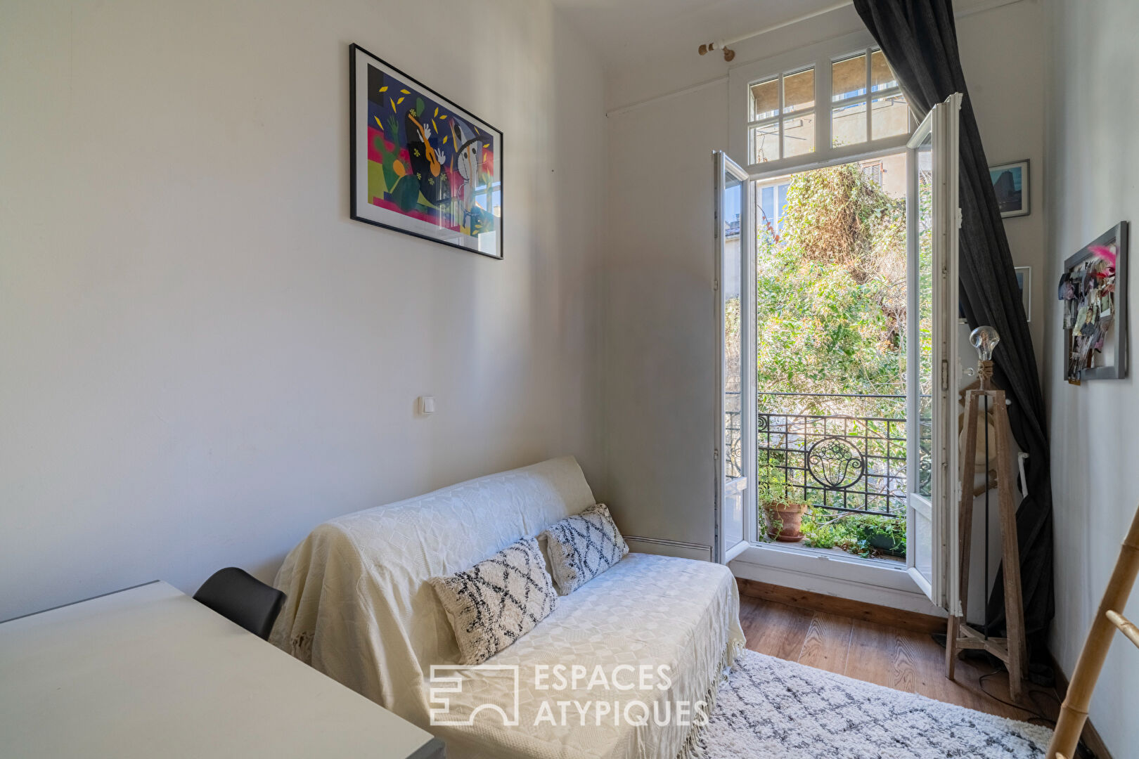 Appartement 4 pièces avec accès toit-terrasse en fond de cour