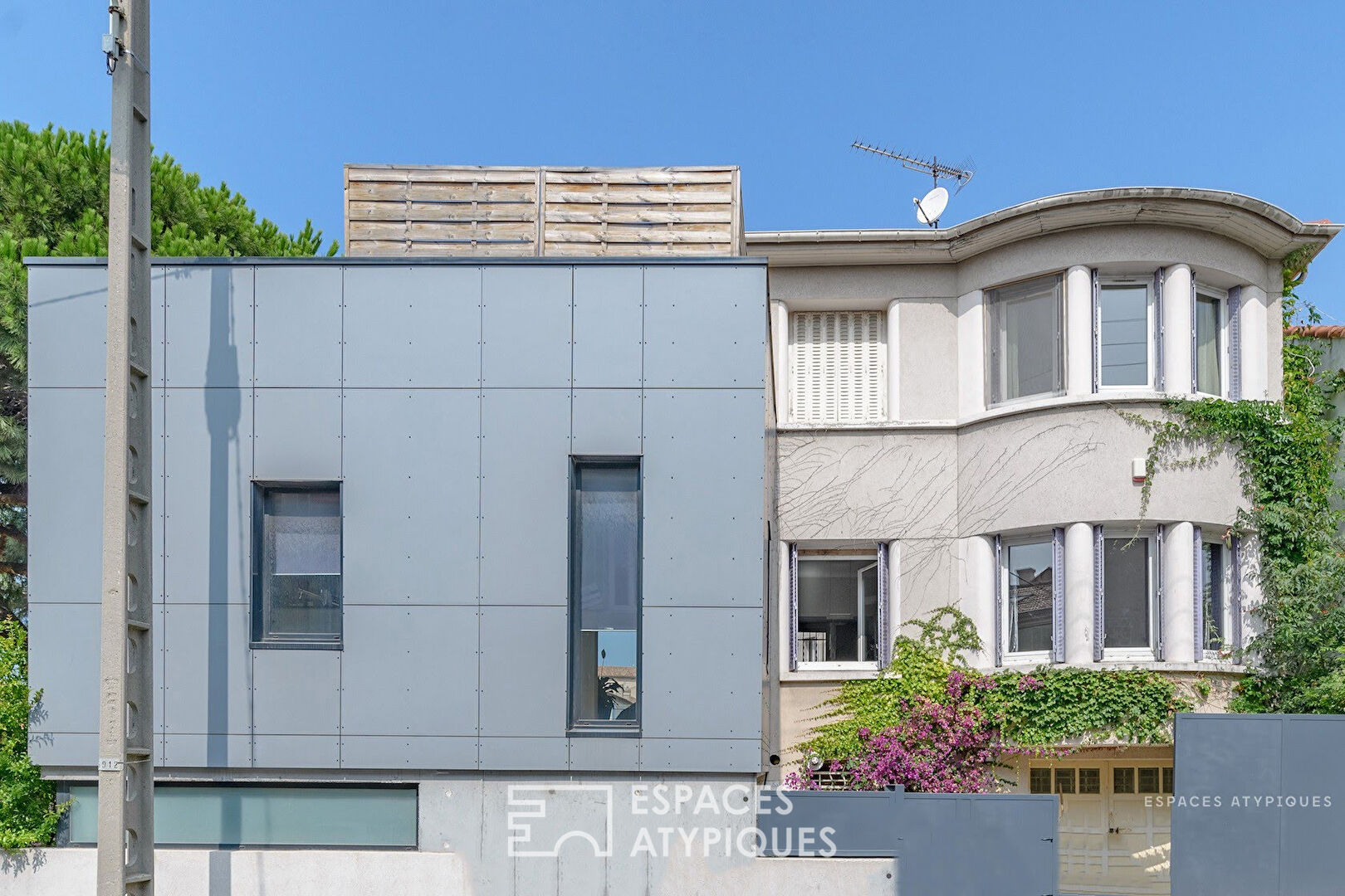 House with brutalist extension