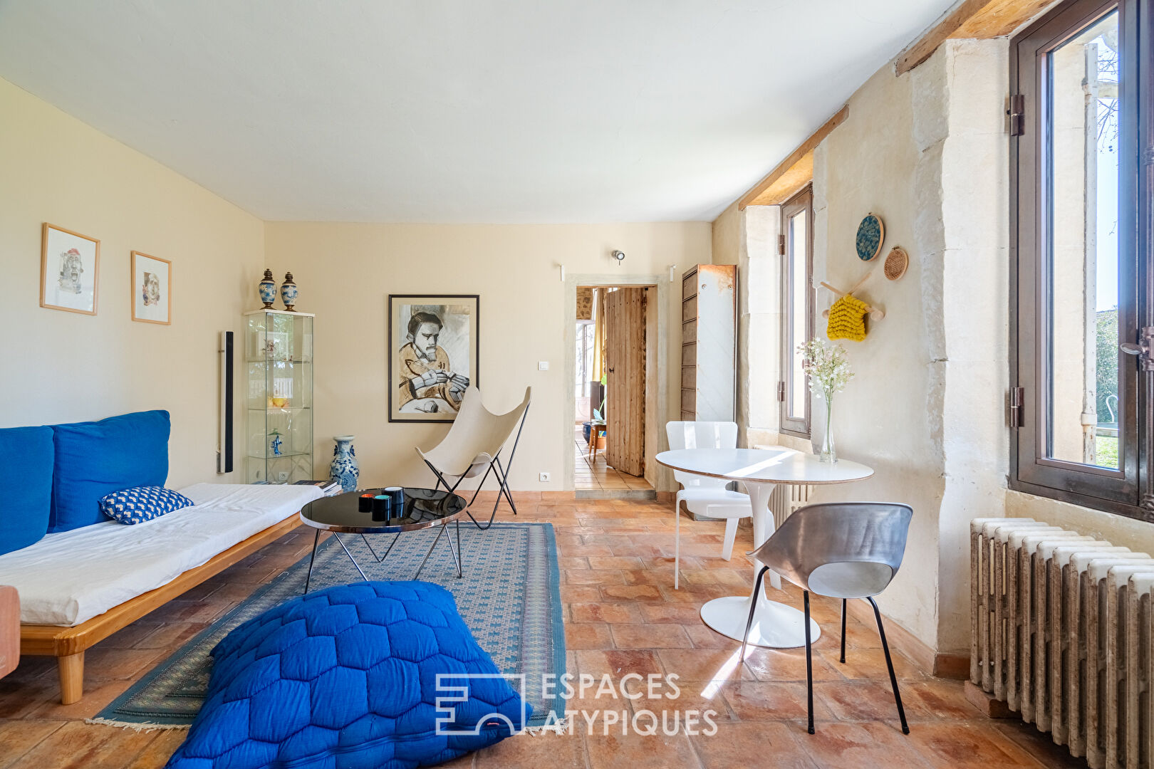 Charm and generous volumes for this renovated stone farmhouse