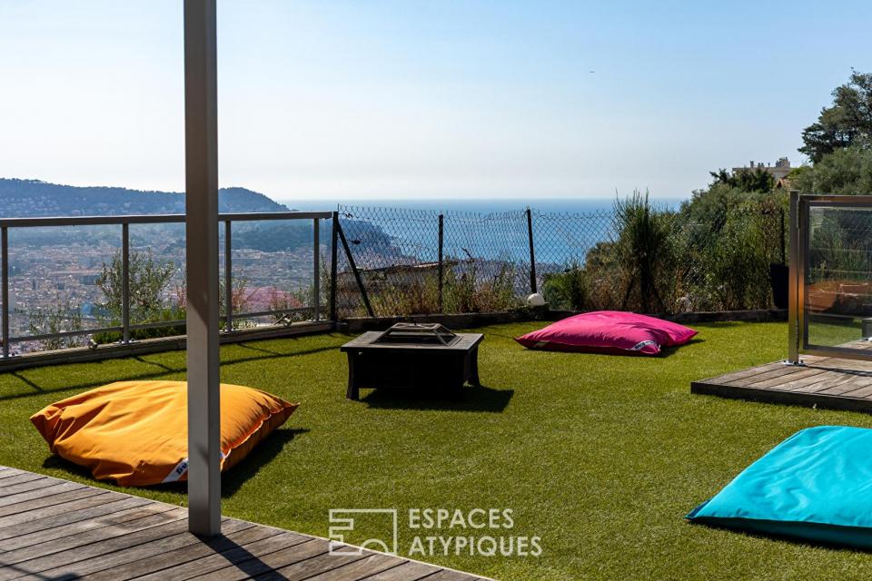 Appartement rez- de- jardin surélevé vue mer et couloir de nage à Nice