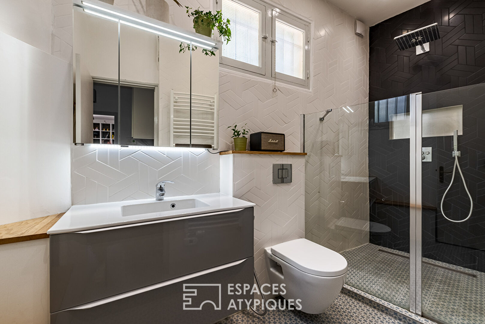 Appartement rénové avec jardin intimiste