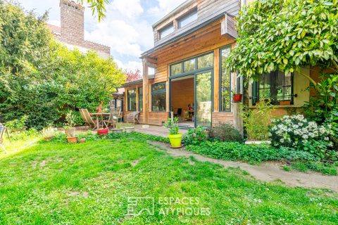 Maison familiale avec véranda et jardin bucolique